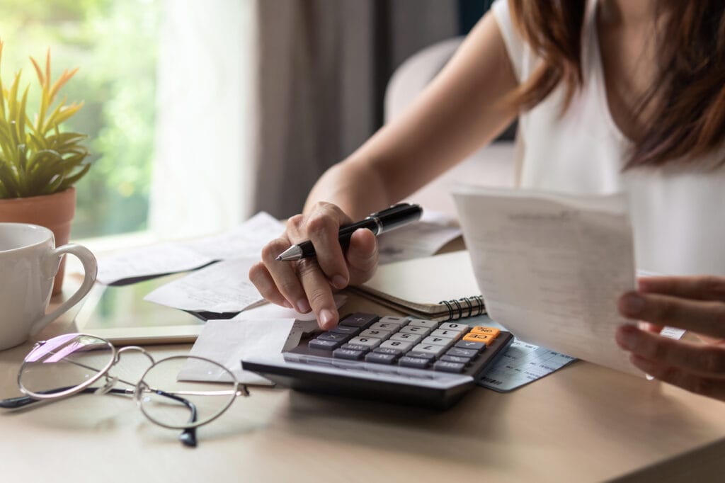 woman assessing debt